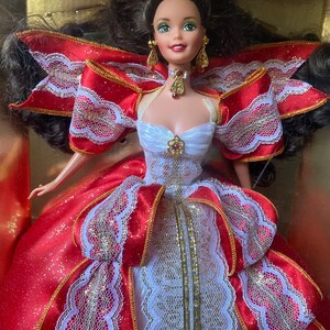 1997 10th Anniversary Happy Holidays Barbie. Never removed from box and as beautiful as ever