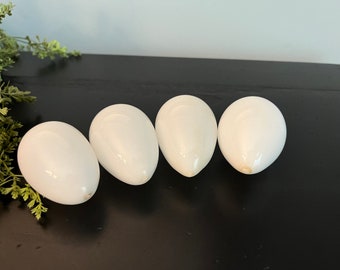 Set of 4 vintage / antique blown milk glass eggs - glossy finish - approx 2 1/2 inches long - varies slightly - chicken, fowl, farm decor