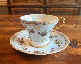 Gorgeous Violets - vintage hand painted Ucagco teacup and saucer - lovely violets with gold details - United China and Glass Company