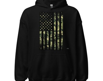 May include: Black hooded sweatshirt with a distressed American flag design featuring a camouflage pattern.