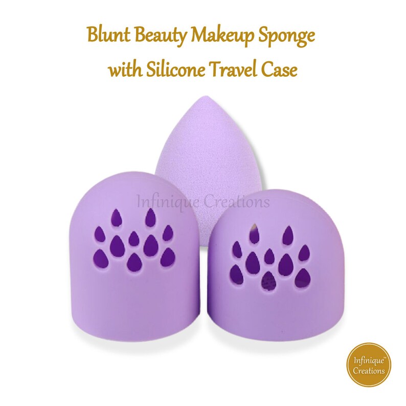 May include: Purple makeup sponge with a purple silicone travel case. The travel case has a pattern of purple raindrops. The text "Infinque Creations" is visible on the sponge.