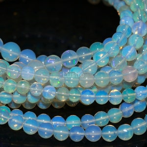 Welo Opal Beads: Natural Ethiopian Round Beads, 16 Inch Strand