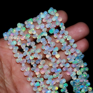 AAA+ Welo Feueropal Perlen: Natürliche Äthiopische Tropfenperlen (4*6 - 7*10 mm)