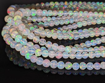 Ethiopian Welo Opal Beads: Natural Fire Opal, Smooth Round (4.5-6.5mm)