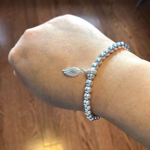 925 cuentas de plata de ley pulsera de estiramiento, pulsera de ala de ángel, joyería de ala de ángel, pulsera de encanto, regalo para ella, regalo de cumpleaños, ala de plata imagen 5