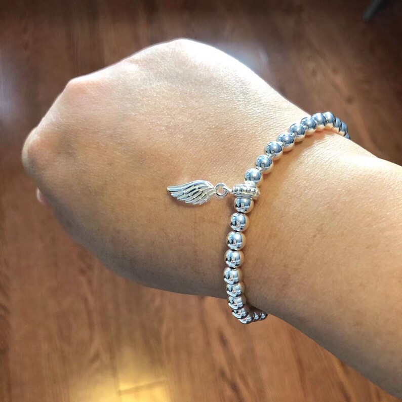925 cuentas de plata de ley pulsera de estiramiento, pulsera de ala de ángel, joyería de ala de ángel, pulsera de encanto, regalo para ella, regalo de cumpleaños, ala de plata imagen 5