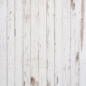 May include: White painted wood paneling with a weathered, distressed look. The wood planks are arranged vertically and have a rustic, vintage feel.
