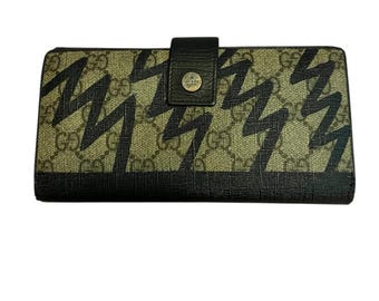 Cartera continental Gucci con diseño de rayo en azul marino con certificado de autenticidad vintage.