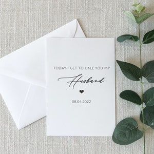 May include: A white card with black text that reads "Today I get to call you my Husband" with a small heart symbol and the date "08.04.2022".