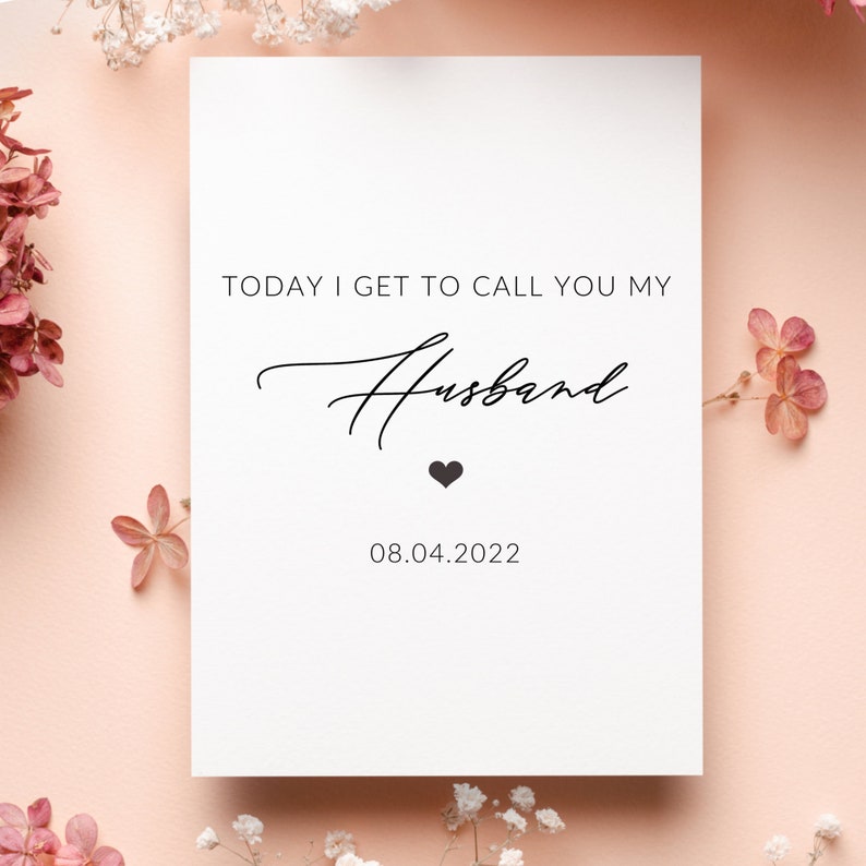 May include: White card with black text that reads "TODAY I GET TO CALL YOU MY Husband" with a small black heart and the date "08.04.2022" below.