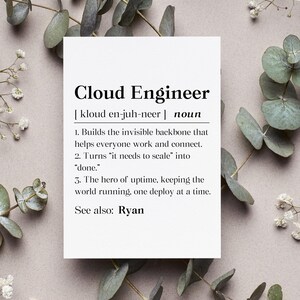 May include: A white card with the text "Cloud Engineer" and its pronunciation, along with a definition. The card is surrounded by green eucalyptus leaves and small white flowers.