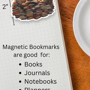 May include: A magnetic bookmark featuring a cartoon illustration of a Black woman sitting on a pile of books. The bookmark is 2 inches tall. Magnetic bookmarks are good for: Books, Journals, Notebooks, Planners. AllMyQueensShop.etsy.com