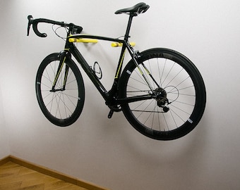 STOOK - gancho de madera para bicicletas / almacenamiento de bicicletas / colgador de bicicletas / colgador de pared para bicicletas / clavijas de madera para bicicletas / portabicicletas (AMARILLO FLUO)