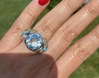 Lalique 18k White Gold Aquamarine Cocktail Ring with Diamond Halo