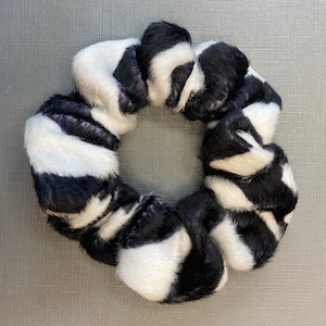 Candice darling in black and white zebra velvet