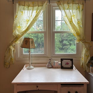 MCM floral curtains  sheer yellow with tie backs