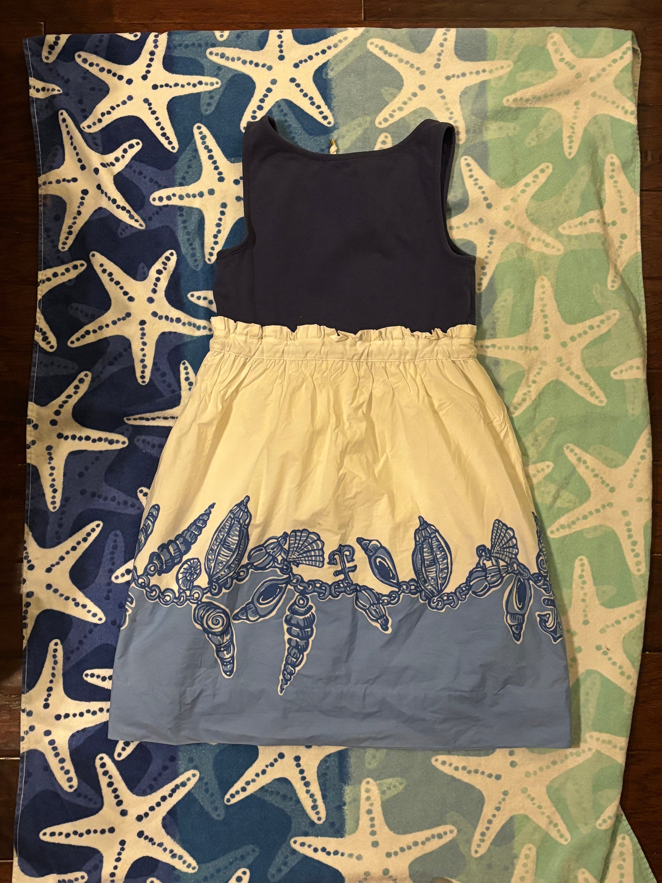 lilly pulitzer navy blue and gold dress Nautical Sailor Dress With Rope Tie Rope Belt Seashell Pattern Light White Summer Lilly Dress Size M Size:Small (US 0-4) Plus Size Sultry Nights dress_type_Bows Floral The straight fit offers