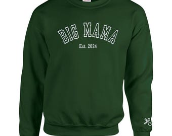 May include: A dark green sweatshirt with the text "BIG MAMA Est. 2024" in white outlined letters.