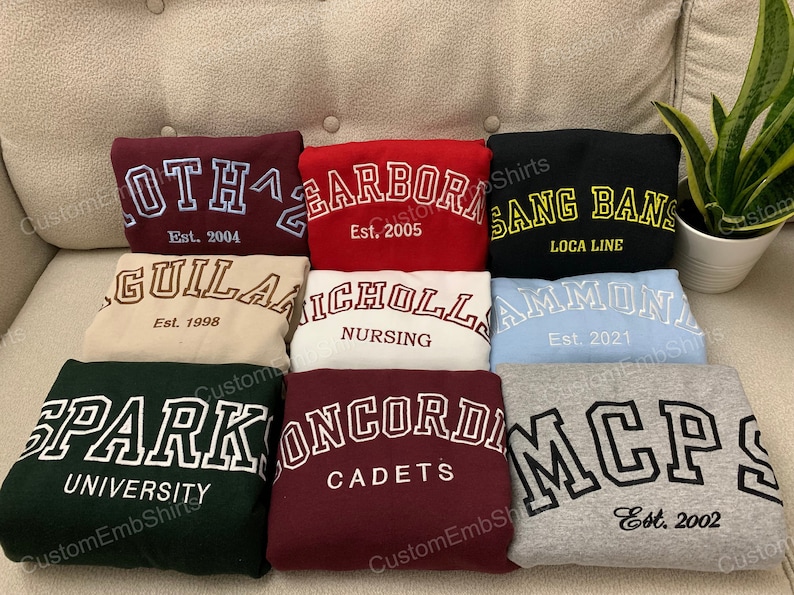 Embclothes personalized embroidered sweatshirts with custom fonts. Multiple choices for fonts and thread colors. Personalized your own embroidered sweatshirts. Perfect personalized gifts for dad, mom, grandpa, grandma...