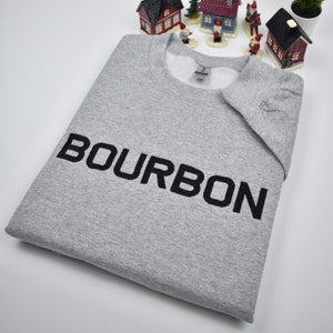 Custom embroidered sweatshirt with athletic font. BOURBON embroidered crewnecks with custom font embroidery. Gray sweatshirt with black thread. Perfect personalized gifts for dad, mom, grandpa, grandma...