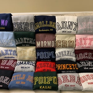 Embclothes personalized embroidered sweatshirts with custom fonts. Multiple choices for fonts and thread colors. Personalized your own embroidered sweatshirts. Perfect personalized gifts for dad, mom, grandpa, grandma...
