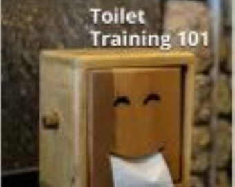May include: A wooden toilet training aid with a smiling face and a roll of toilet paper. The title "Toilet Training 101" is printed above the aid. The text "Includes the Essential Talking Points, Answers to Your Questions and Guide" is printed below the aid.
