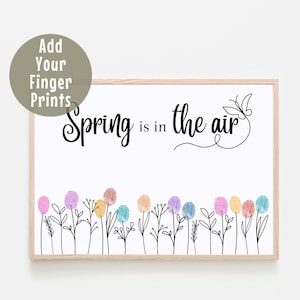 Puede incluir: Una impresión de arte imprimible con el texto "Spring is in the air" y una mariposa. La impresión presenta una fila de flores con círculos en blanco para pintar con los dedos.