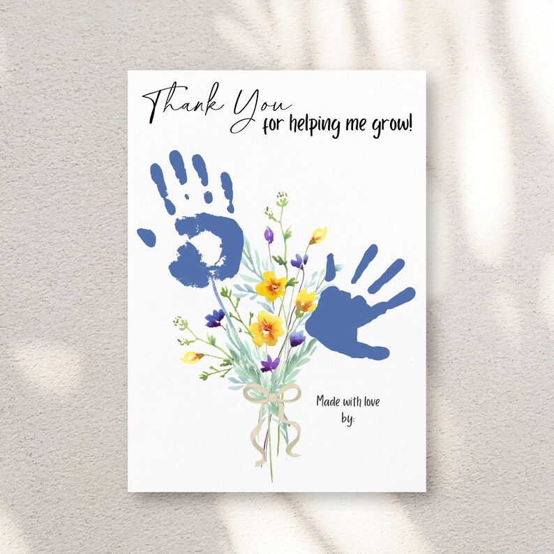 May include: A white card with the text "Thank You for helping me grow!" features blue handprints and a watercolor bouquet of yellow, purple, and green flowers. The words "Made with love by" are also included.
