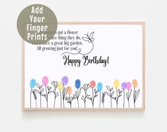 May include: A framed print with the text "Happy Birthday!" and space for fingerprints to create colorful flowers. The print includes the text "Add Your Finger Prints" and a poem about a garden.