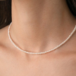 thin small tiny irregular pearl necklace choker on the model, cultured freshwater pearls