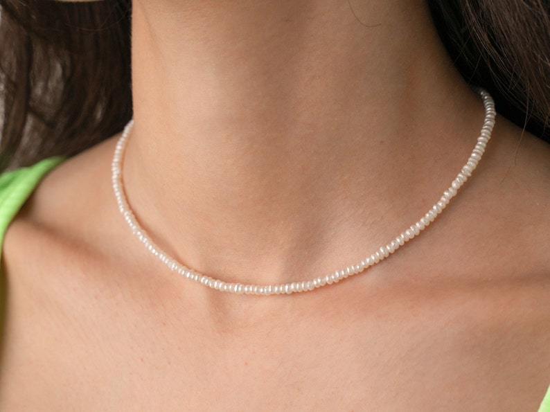 thin small tiny irregular pearl necklace choker on the model, cultured freshwater pearls