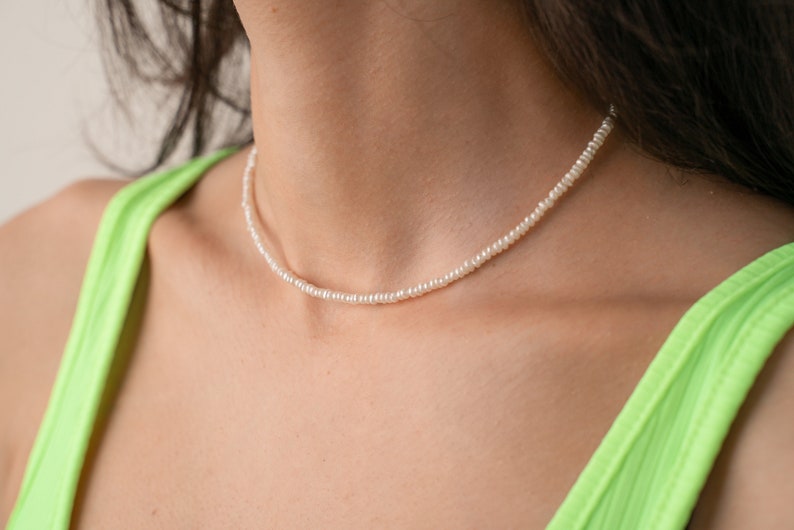 thin small tiny irregular pearl necklace choker on the model, cultured freshwater pearls