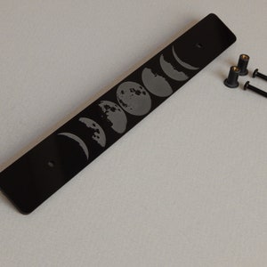 License Plate Delete &quot;Moon Phases&quot; laser cut and engraved from acrylic for Subaru models with factory JDM holes 210mm apart