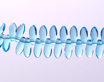 100 - Czech Glass Daggers • 3 x 7 mm • Transparent Aqua Blue