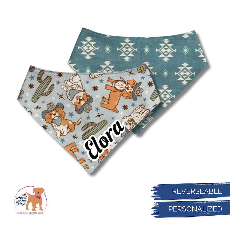 May include: Two reversible dog bandanas. One is light blue with cartoon dogs wearing cowboy hats, cacti, and stars. The other is teal with a geometric pattern. The name "Elora" is printed on the light blue bandana.