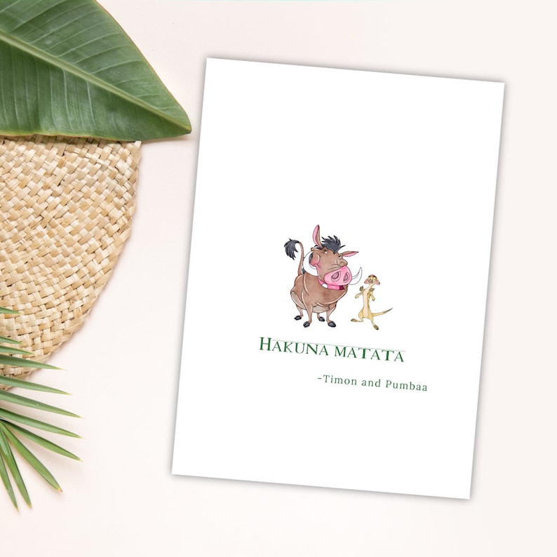 May include: A white card with a green border featuring a cartoon image of Timon and Pumbaa from Disney's The Lion King. The text "Hakuna Matata" is written in green below the image, followed by "Timon and Pumbaa" in smaller green text.