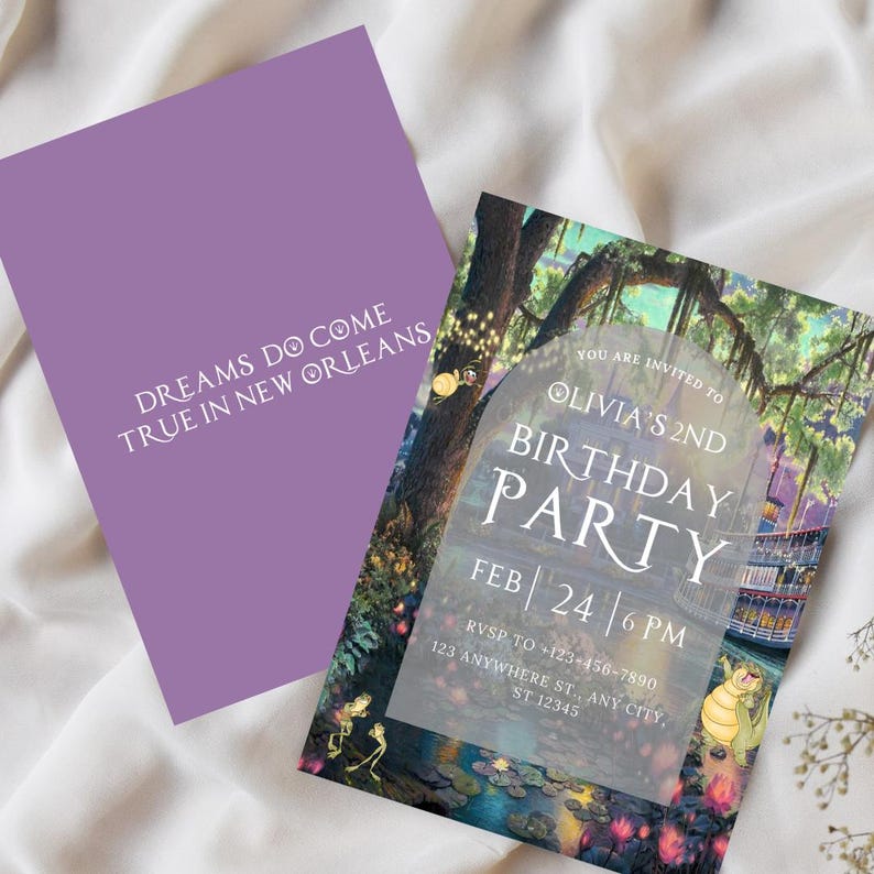 May include: A purple invitation card with white text that reads "Dreams do come true in New Orleans". The invitation is for Olivia's 2nd birthday party. The background of the invitation is a watercolor illustration of a swamp scene with a boat, frogs, and lily pads.