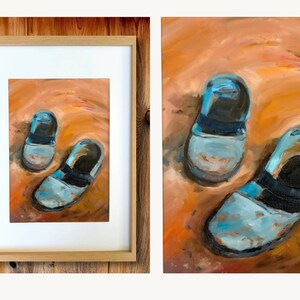 May include: A painting depicting two blue and white shoes on a brown background. The shoes have black straps and show signs of wear.