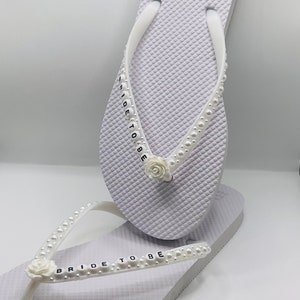 Faux pearl personalised bride bridal white flip flops | honeymoon | wedding day night | breakfast | beach | sandals | wifey | Mrs | to be |