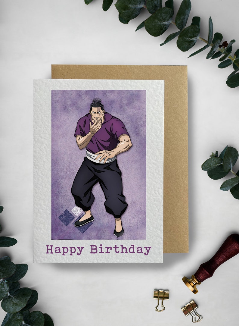 May include: A purple and white birthday card featuring an anime character with black hair and a purple shirt. The text "Happy Birthday" is printed on the card.