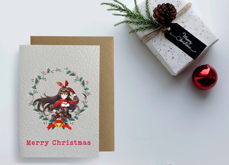 May include: A Christmas card featuring an anime-style woman in a red and brown outfit standing in a wreath of holly with red berries. The text "Merry Christmas" is printed in red at the bottom of the card.