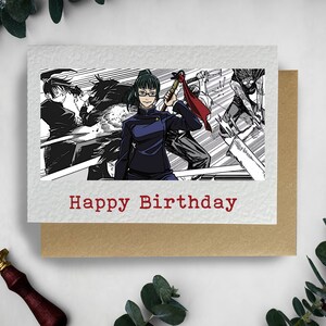 May include: A birthday card featuring a black and white manga style illustration of a woman with green hair and glasses holding a weapon. The text "Happy Birthday" is printed in red at the bottom of the card.