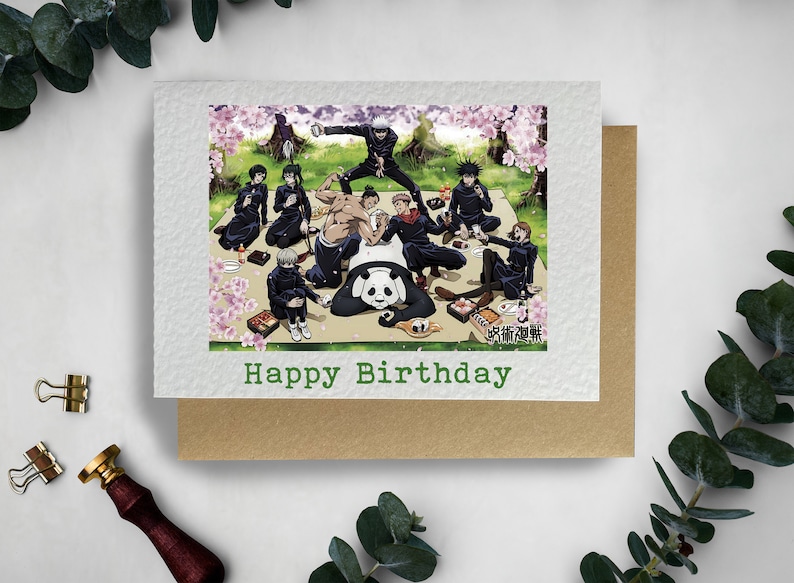 May include: A birthday card featuring a group of anime characters having a picnic with a panda. The card has a green background with the text "Happy Birthday" in green.