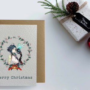 May include: A Christmas card featuring a character with blue hair and a green and red wreath with holly berries. The card has the text "Merry Christmas" at the bottom.