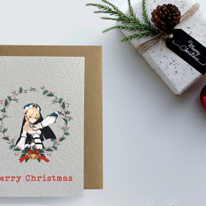 May include: A Christmas card featuring an anime character in a wreath with the text "Merry Christmas".
