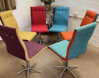 6 Italian swivel dining chairs newly reupholstered in multicoloured tweed fabric