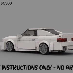May include: A white Lego model of a Lexus SC300 car. The model is detailed with black wheels and red taillights. The image includes the text "Lexus SC300" and "PDF INSTRUCTIONS ONLY - NO BRICKS".