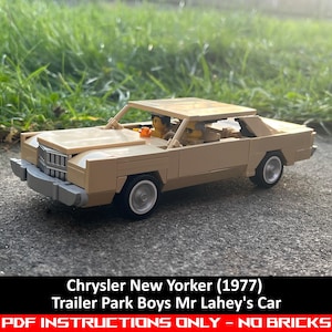 May include: A beige Lego model of a 1977 Chrysler New Yorker, a car from the TV show Trailer Park Boys. The car has two minifigures inside. The text "Chrysler New Yorker (1977) Trailer Park Boys Mr Lahey's Car PDF INSTRUCTIONS ONLY - NO BRICKS" is printed below the car.