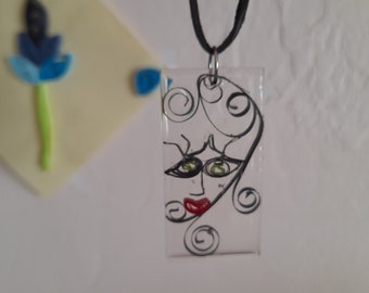quilling face necklaces, quilling faces, handmade paper art pendant, paper face necklace in resin