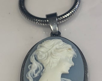 Blue Cameo Pendant on 20 inch stainless steel silver snake chain. Choose from 2 colours .